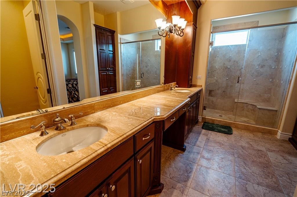 861 Majestic Ridge Court Henderson, NV 89052 - Photo 18 of 68 Full bath featuring double vanity and a stall shower