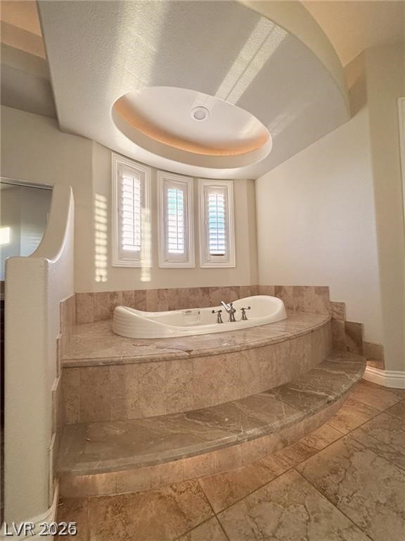 861 Majestic Ridge Court Henderson, NV 89052 - Photo 41 of 68 Full bath with a garden tub and a tray ceiling