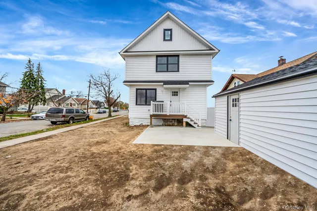 a view of a street with cars
