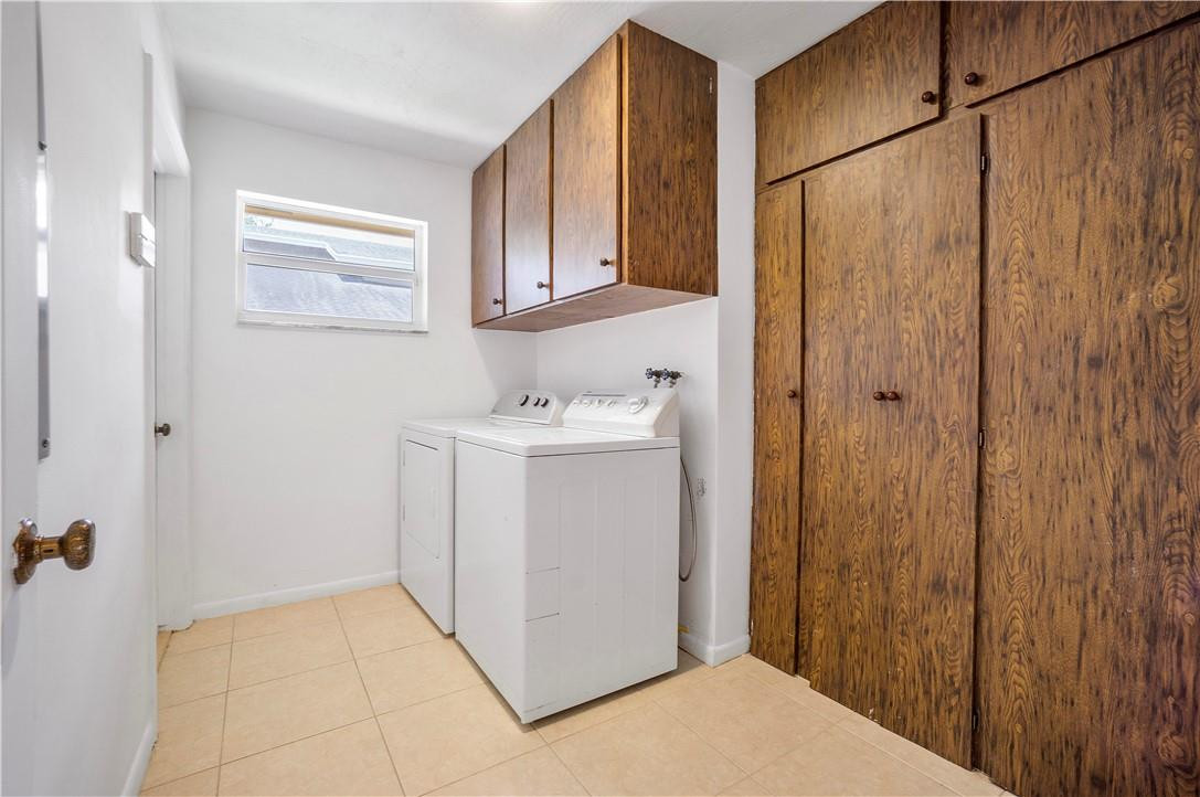1423 Southwest 14th Street Boca Raton, FL 33486 - Photo 24 of 45 a bathroom with a sink and a mirror
