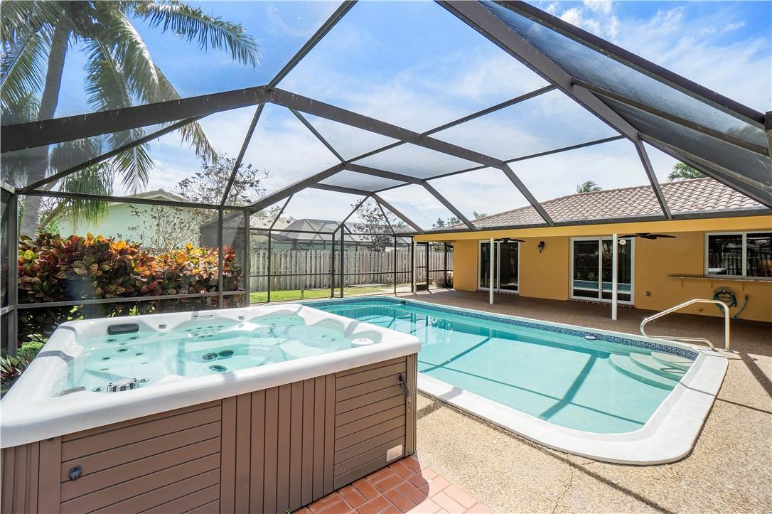 1423 Southwest 14th Street Boca Raton, FL 33486 - Photo 3 of 45 a view of a backyard with sitting area