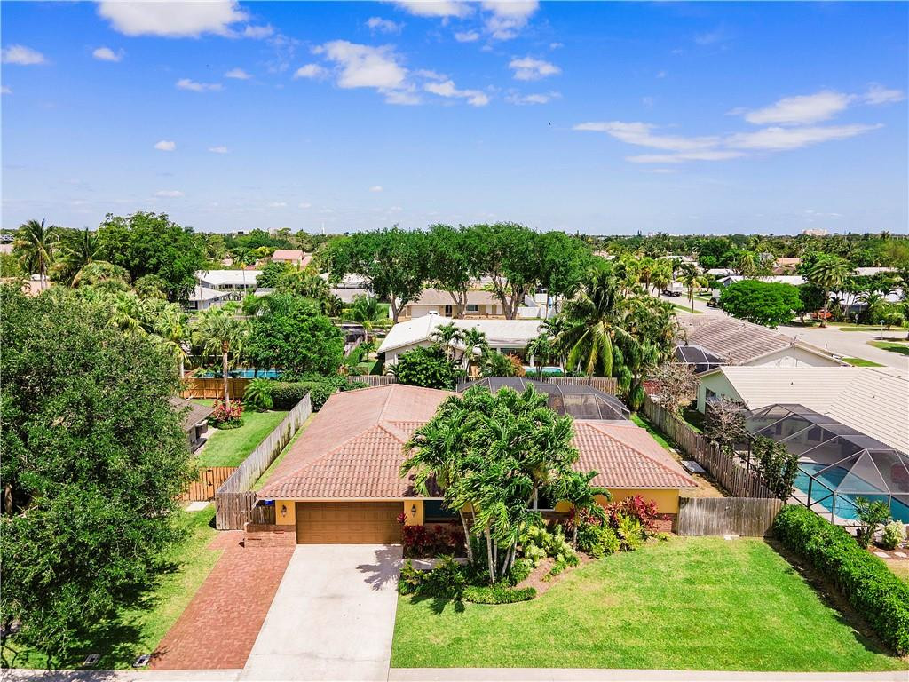 1423 Southwest 14th Street Boca Raton, FL 33486 - Photo 38 of 45 an aerial view of a house with a garden