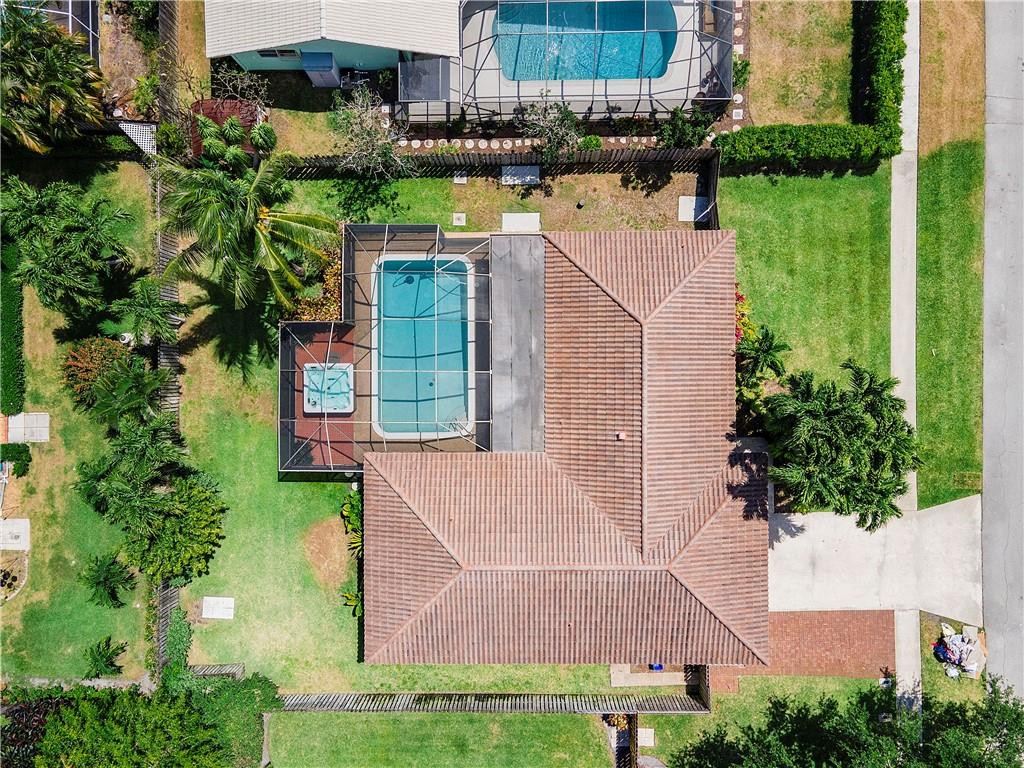 1423 Southwest 14th Street Boca Raton, FL 33486 - Photo 42 of 45 front view of house with a yard and potted plants