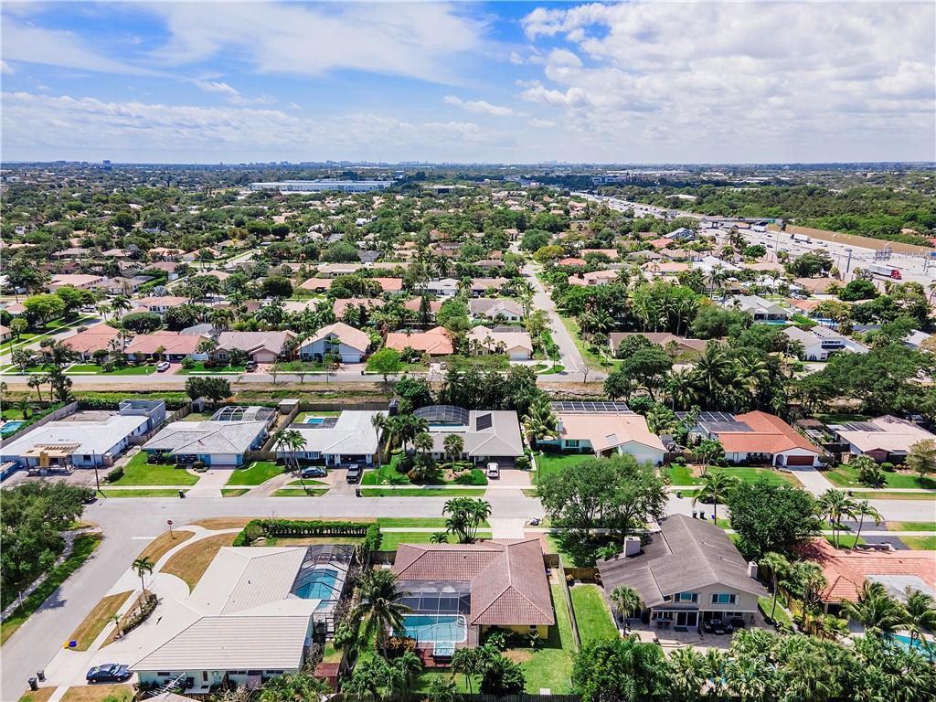 1423 Southwest 14th Street Boca Raton, FL 33486 - Photo 45 of 45 an aerial view of residential houses with outdoor space