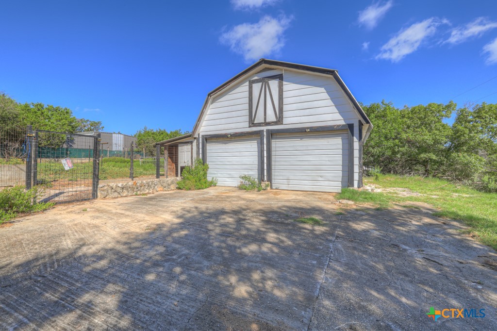 500 Line Camp Loop Spring Branch, TX 78070 - Photo 11 of 48 a view of a house with backyard and garden