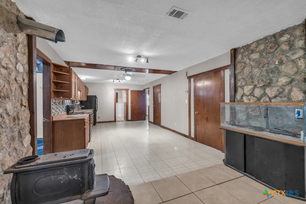 500 Line Camp Loop Spring Branch, TX 78070 - Photo 17 of 48 a view of a kitchen with a sink and a refrigerator