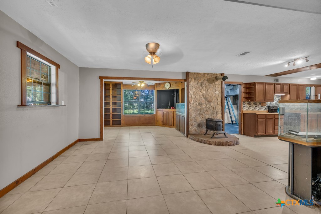 500 Line Camp Loop Spring Branch, TX 78070 - Photo 22 of 48 a view of a livingroom with furniture and a ceiling fan