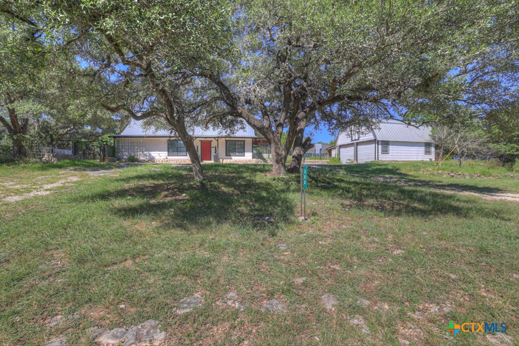 500 Line Camp Loop Spring Branch, TX 78070 - Photo 3 of 48 a view of a house with a yard