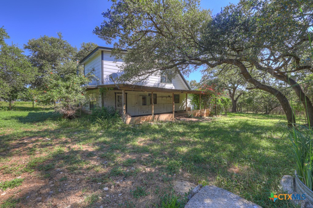 500 Line Camp Loop Spring Branch, TX 78070 - Photo 41 of 48 a view of a house with a yard