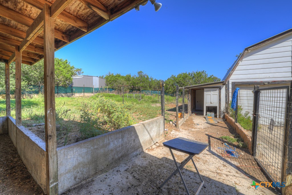 500 Line Camp Loop Spring Branch, TX 78070 - Photo 44 of 48 a view of a two chairs with an outdoor space