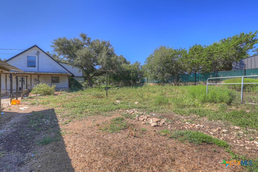 500 Line Camp Loop Spring Branch, TX 78070 - Photo 47 of 48 a view of a house with backyard and a tree