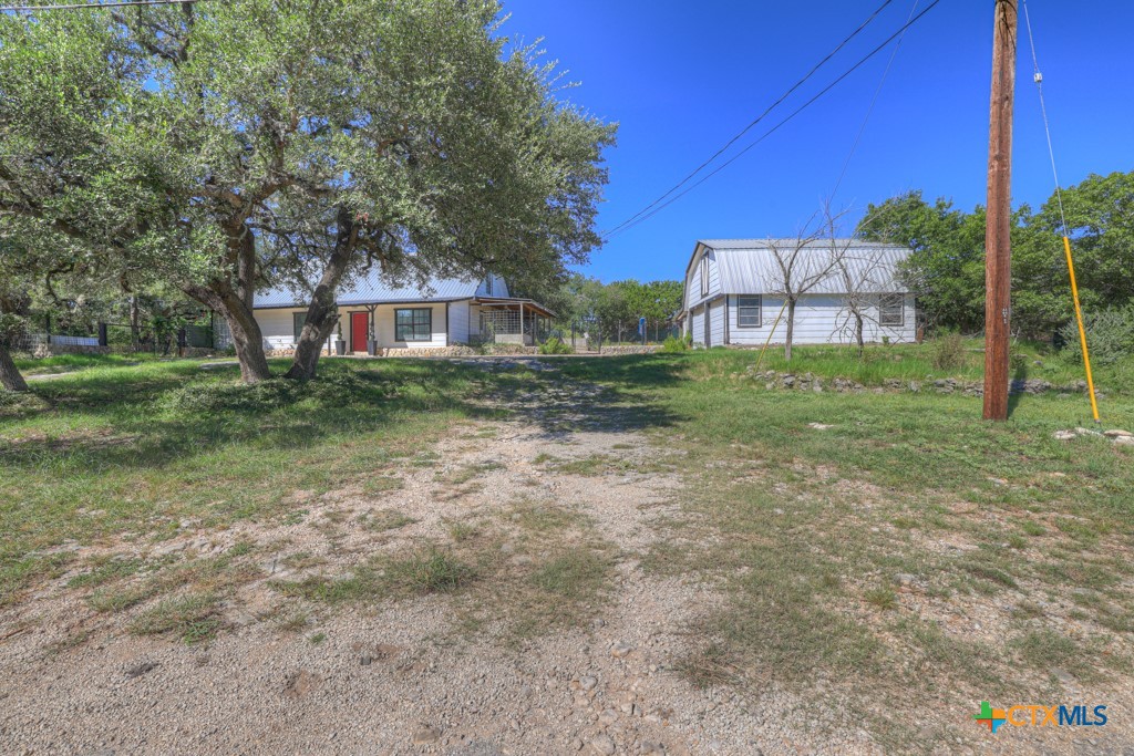 500 Line Camp Loop Spring Branch, TX 78070 - Photo 6 of 48 a view of a house with a yard