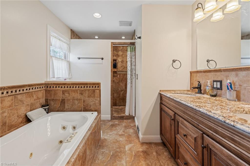 1625 Grooms Road Reidsville, NC 27320 - Photo 24 of 50 Large, updated primary en suite.