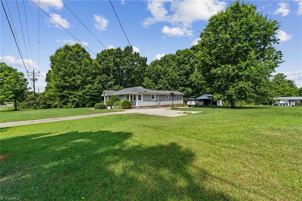 1625 Grooms Road Reidsville, NC 27320 - Photo 38 of 50 Side view of home showing ample yard space