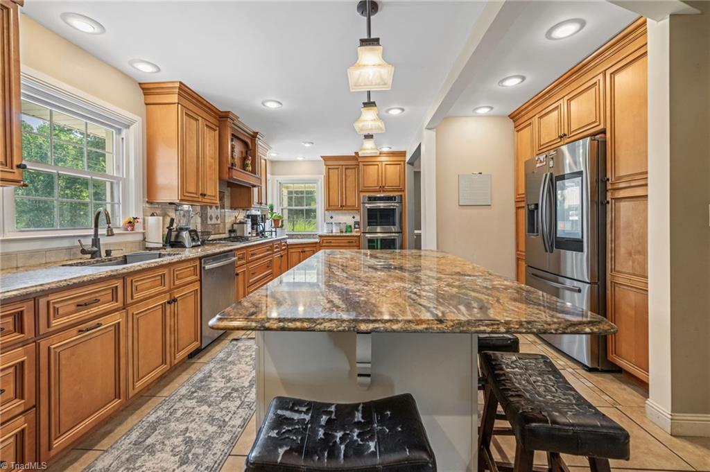 1625 Grooms Road Reidsville, NC 27320 - Photo 6 of 50 This kitchen features a HUGE island, perfect for entertaining!