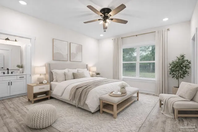 a bathroom with a double vanity sink a mirror and a bathtub