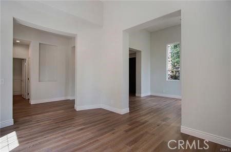 35 Winslow Street Ladera Ranch, CA 92694 - Photo 17 of 17 an empty room with wooden floor and windows