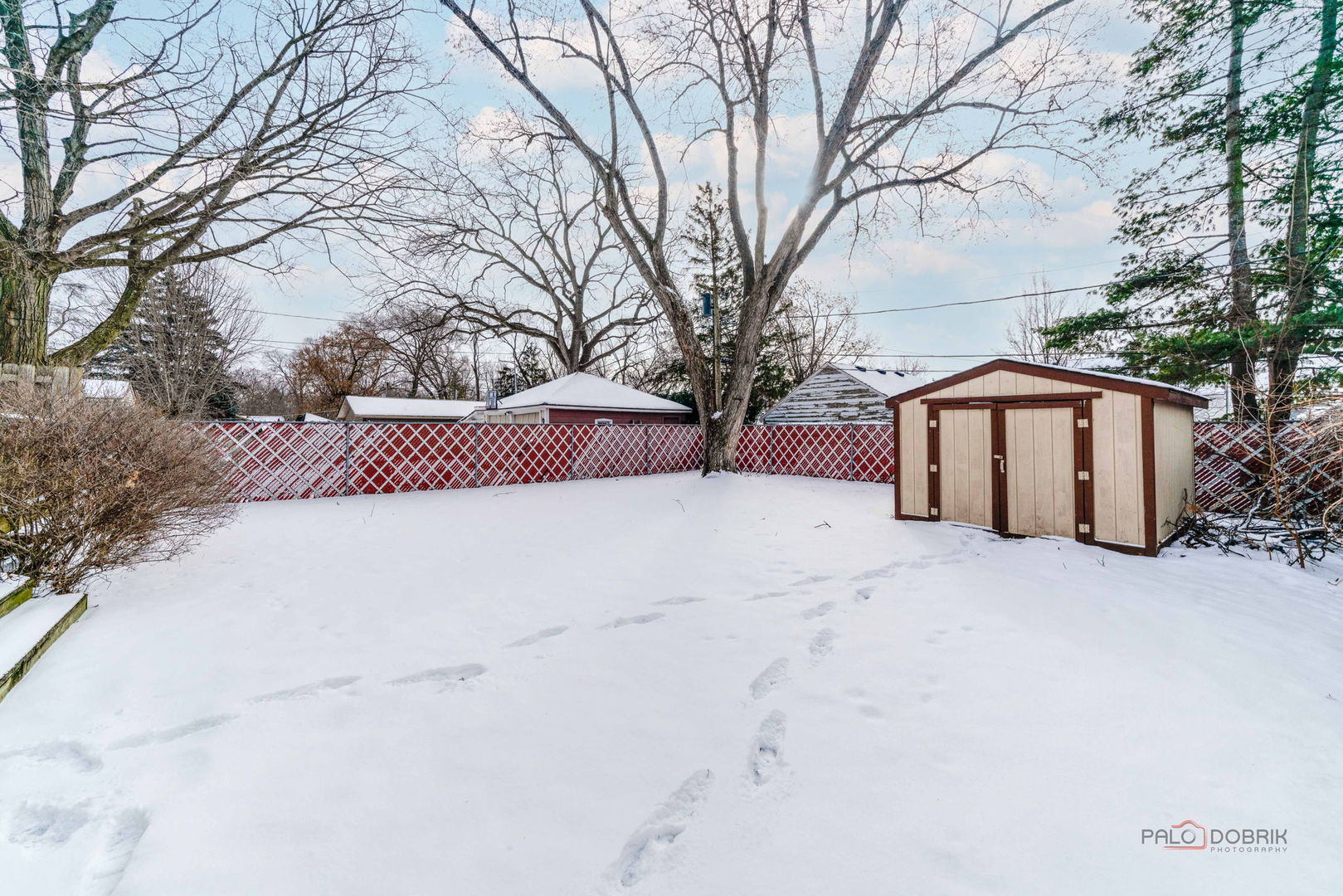 225 Walker Place Mundelein, IL 60060 - Photo 26 of 26 a view of a house with a snow in the yard