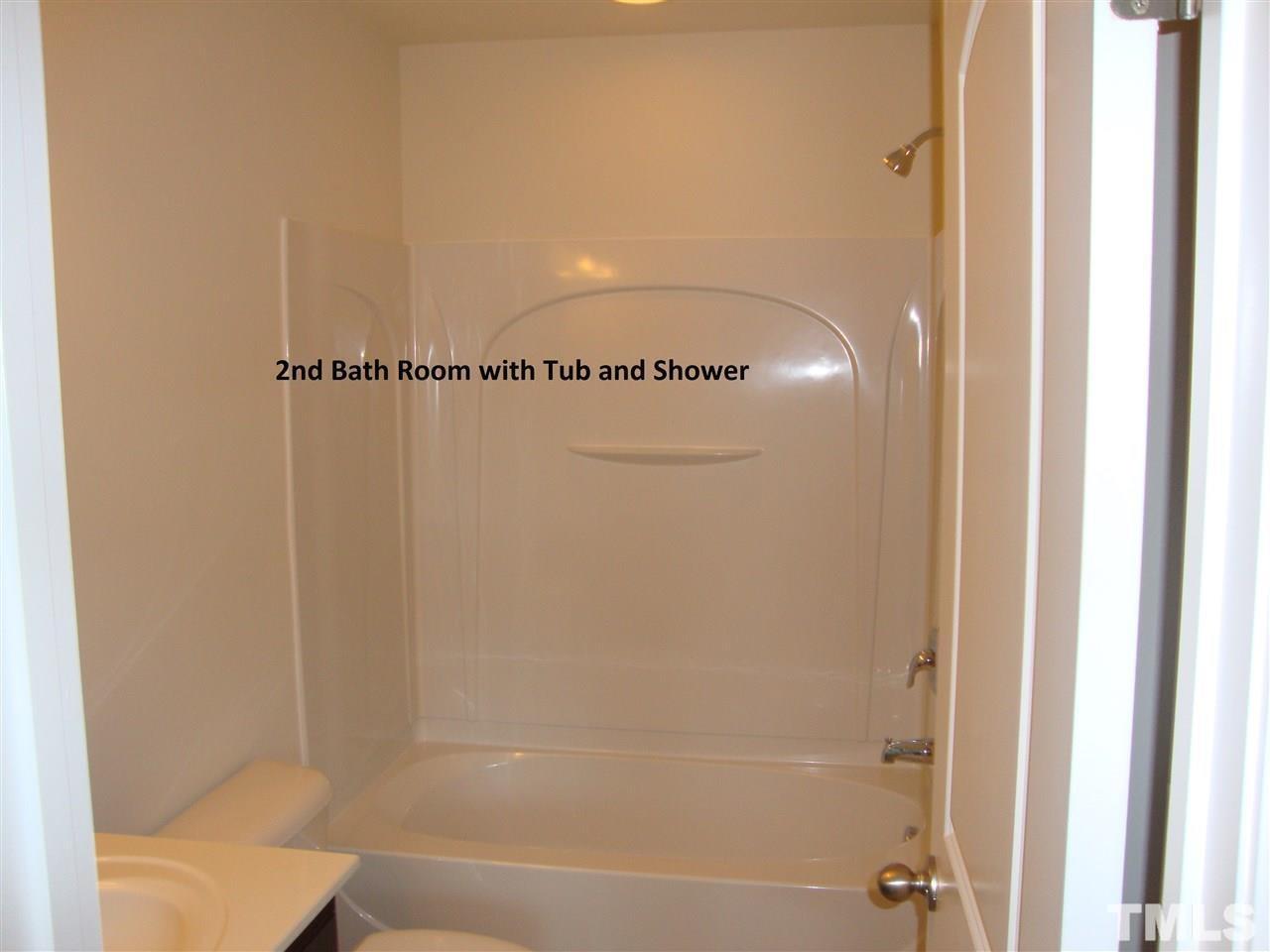 85 Intuition Circle Durham, NC 27705 - Photo 12 of 17 a bathroom with a bathtub