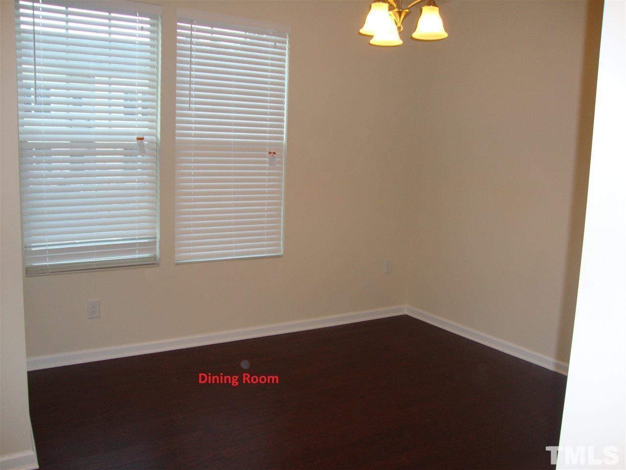 85 Intuition Circle Durham, NC 27705 - Photo 16 of 17 an empty room with a window