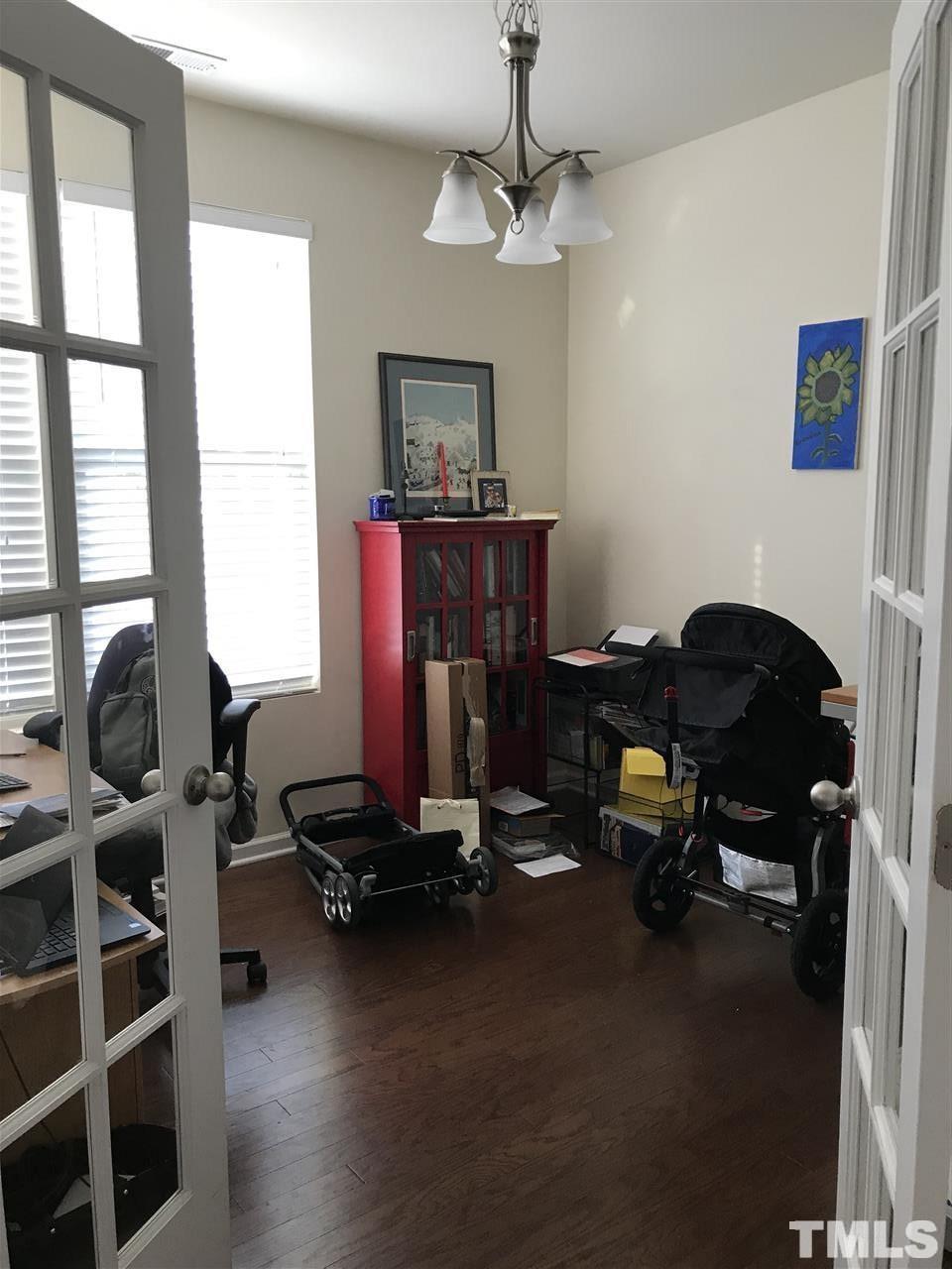 85 Intuition Circle Durham, NC 27705 - Photo 17 of 17 a view of a workspace with furniture and a window
