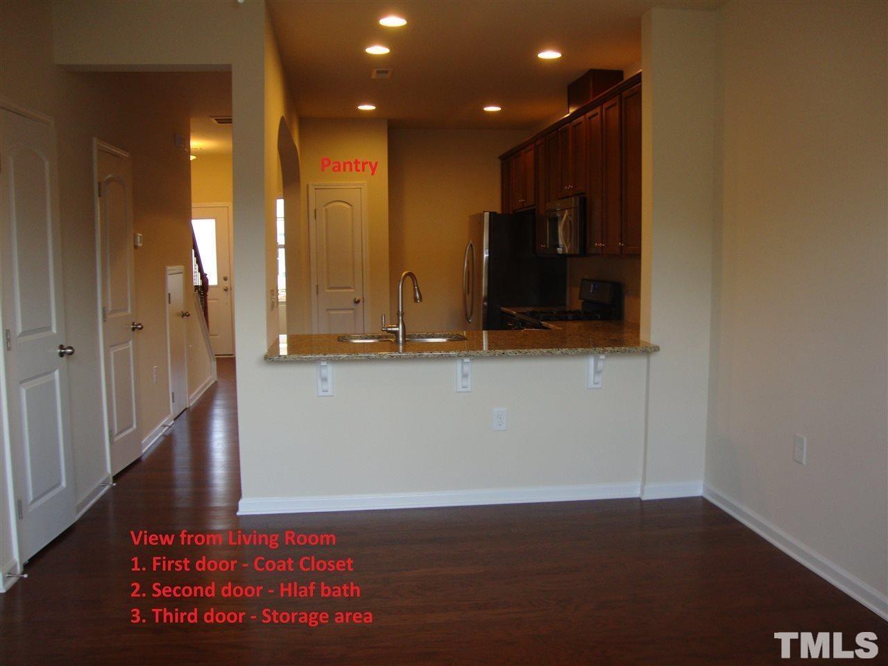 85 Intuition Circle Durham, NC 27705 - Photo 2 of 17 a view of hallway with wooden floor