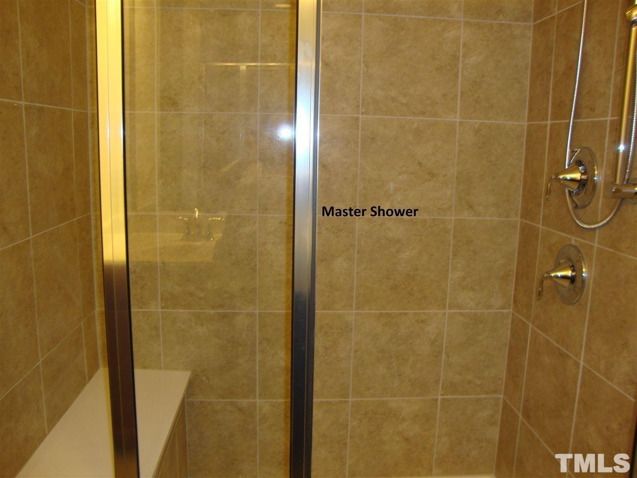 85 Intuition Circle Durham, NC 27705 - Photo 7 of 17 a bathroom with a shower