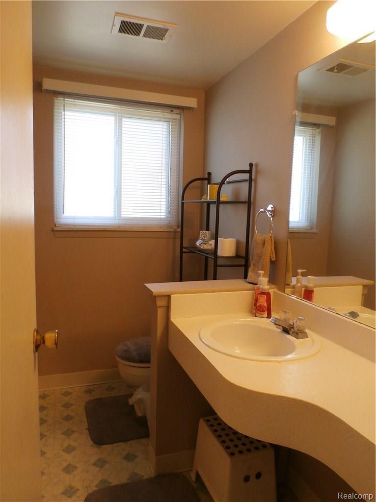 7528 Kingsbridge Road Canton, MI 48187 - Photo 11 of 24 lower level 1/2 bath