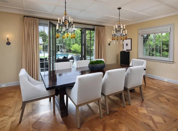 a view of a dining room with furniture window and outside view