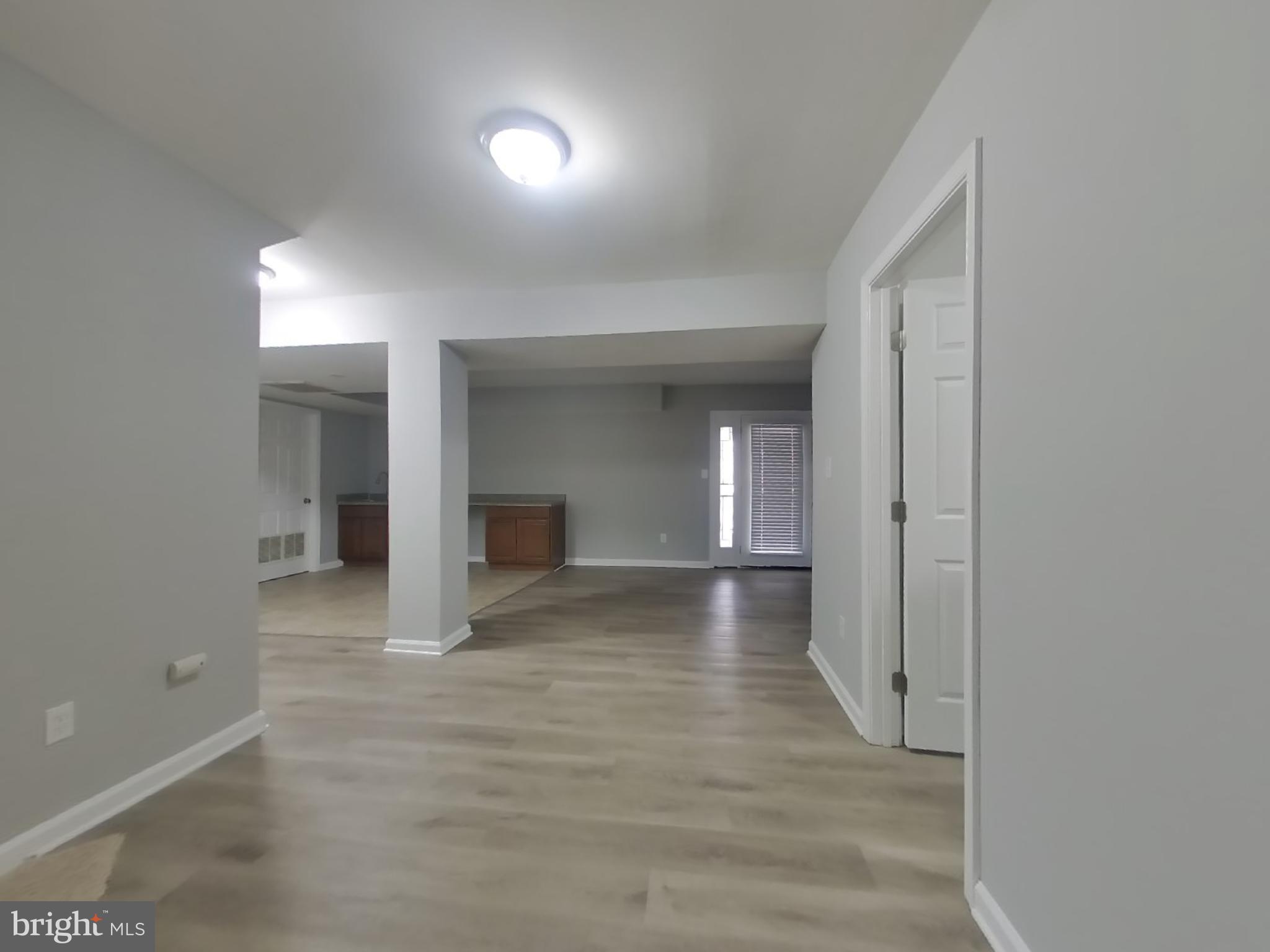 1614 Thomas Road Fort Washington, MD 20744 - Photo 17 of 20 a view of empty room with wooden floor