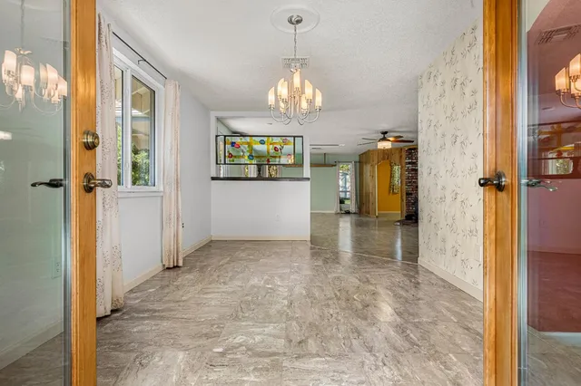 a bathroom with a shower and a toilet