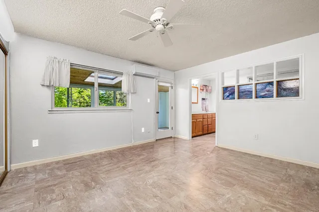 a bathroom with a double vanity sink mirror and shower