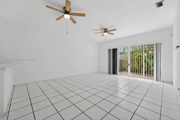 a view of an empty room and window