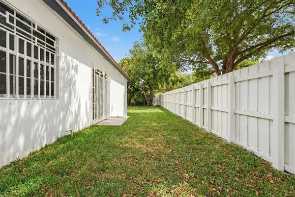 a view of a backyard with a garden