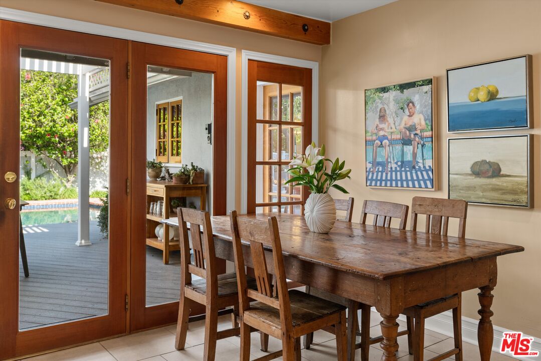 16355 Mandalay Drive Encino, CA 91436 - Photo 12 of 45 a view of a dining room with furniture window and wooden floor