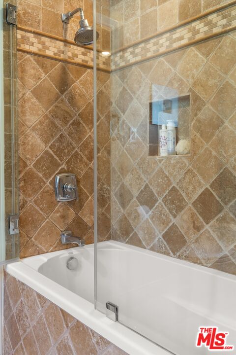 16355 Mandalay Drive Encino, CA 91436 - Photo 17 of 45 a bathroom with a bathtub and a shower