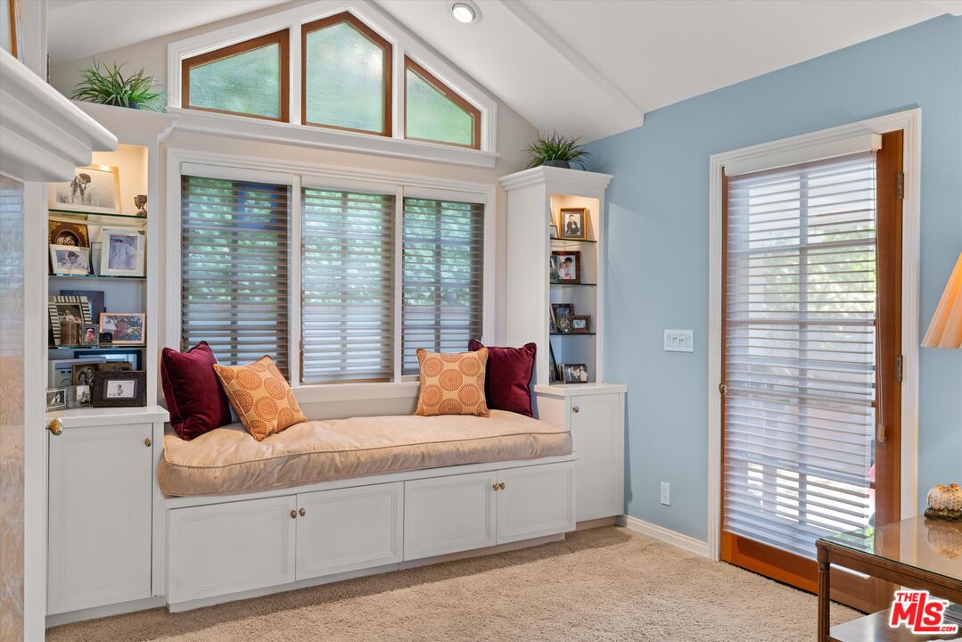 16355 Mandalay Drive Encino, CA 91436 - Photo 22 of 45 a bedroom with furniture and a large window