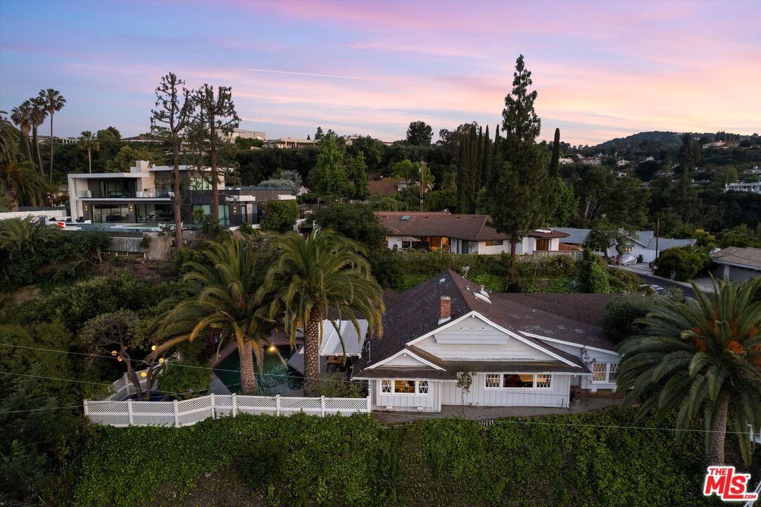 16355 Mandalay Drive Encino, CA 91436 - Photo 44 of 45 a view of house with garden and trees