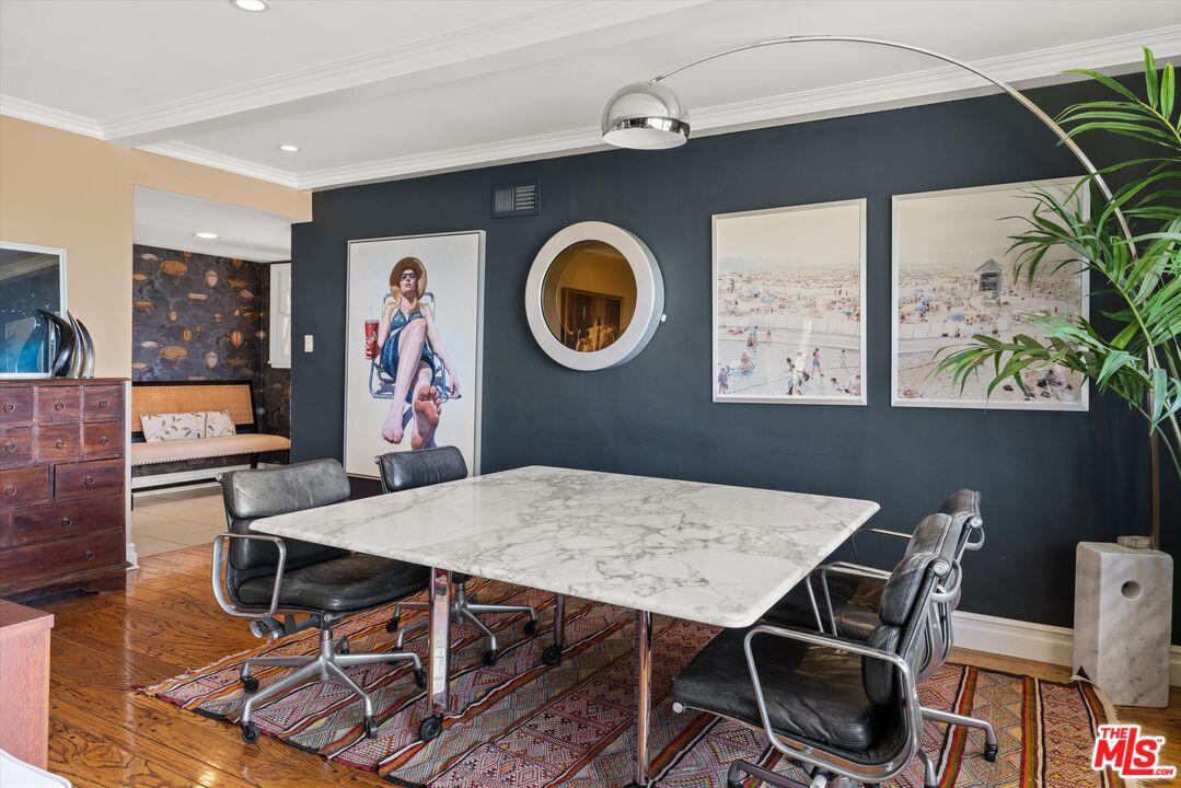 16355 Mandalay Drive Encino, CA 91436 - Photo 6 of 45 a view of a dining room with furniture and chandelier