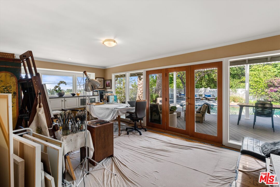 16355 Mandalay Drive Encino, CA 91436 - Photo 9 of 45 a view of a dining room with furniture window and outside view