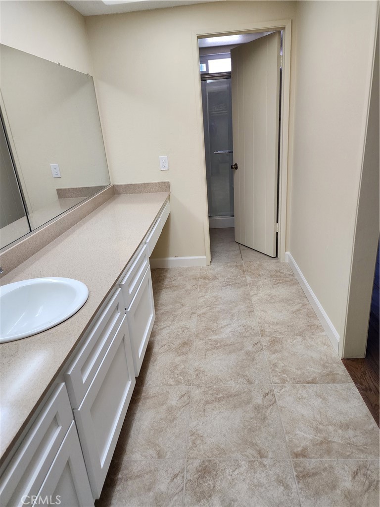 402 West Kelly Avenue, Unit A Orange, CA 92866 - Photo 7 of 13 a view of kitchen and utility room