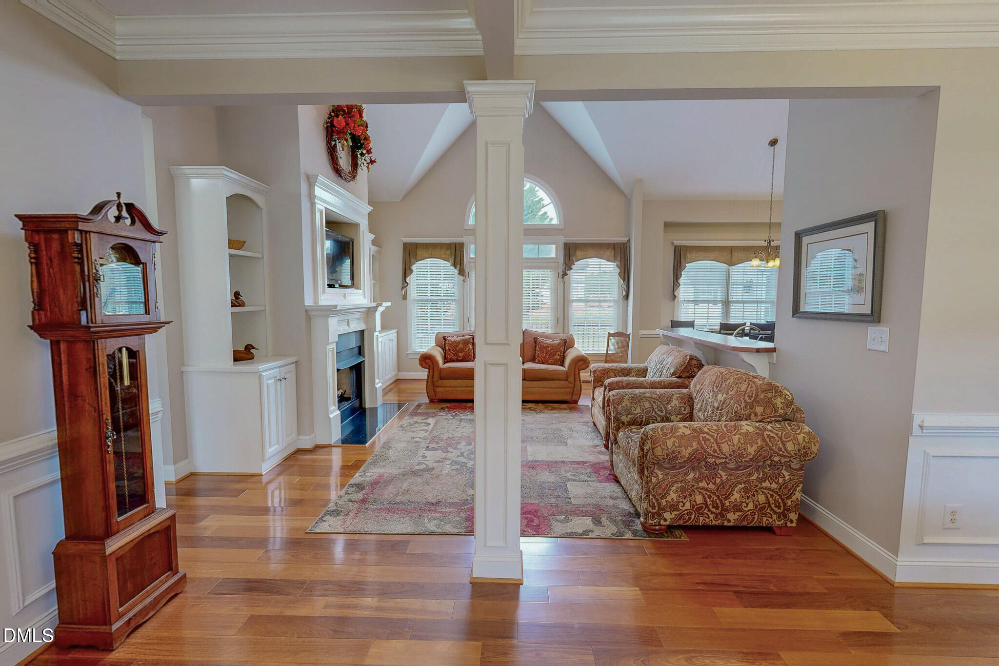 115 Duncan Plantation Road Timberlake, NC 27583 - Photo 24 of 48 a living room with furniture and a flat screen tv
