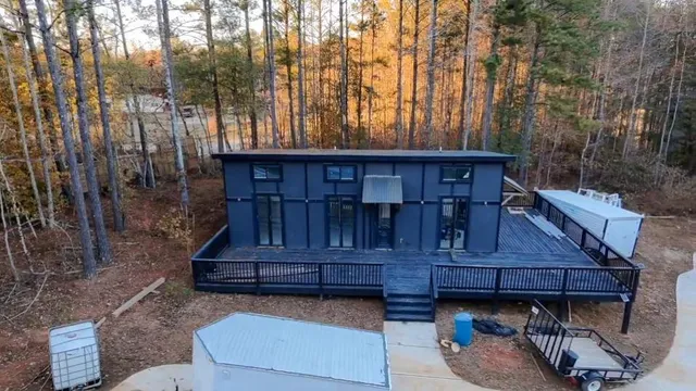 a view of a small house with wooden floor