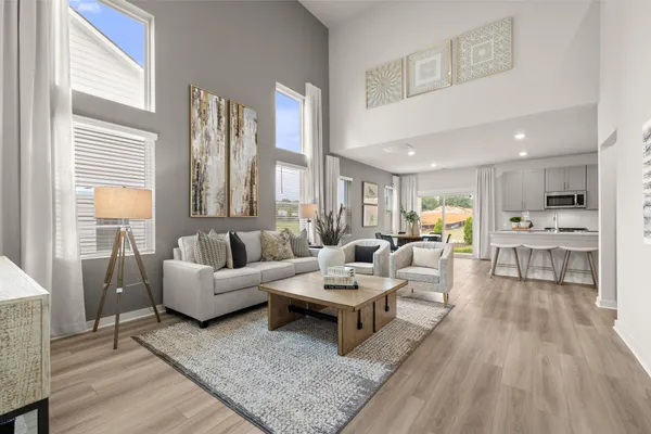 a living room with furniture and a table