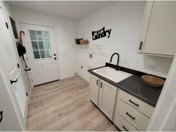 a black and white photo of a living room