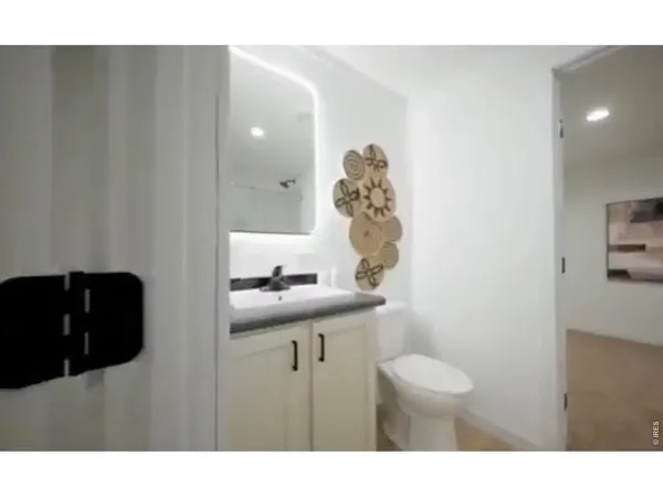 a black and white photo of a living room