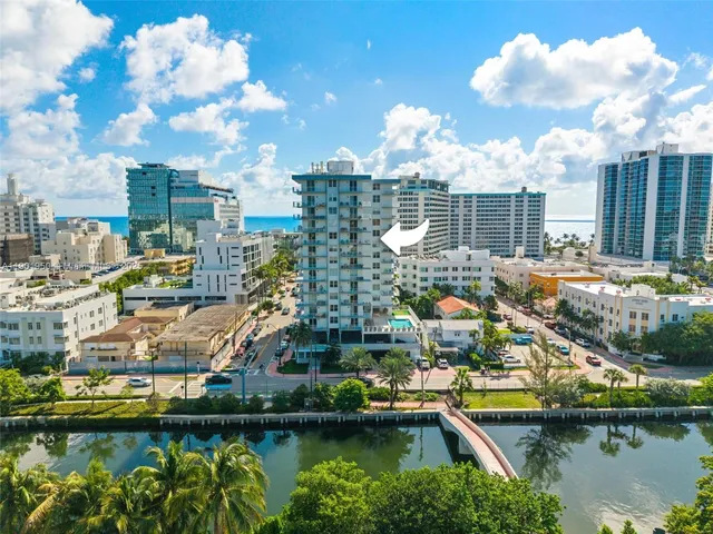 a view of a city with a lake