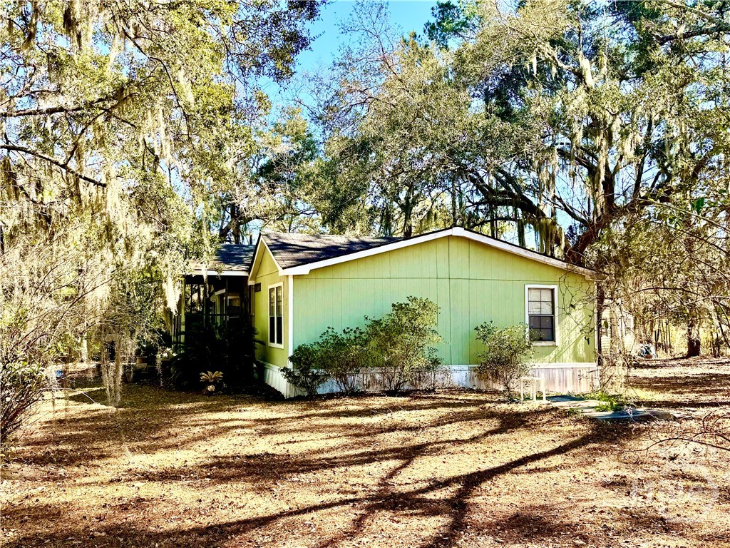 49 Clem Road Midway, GA 31320 - Photo 7 of 15 Side Elevation