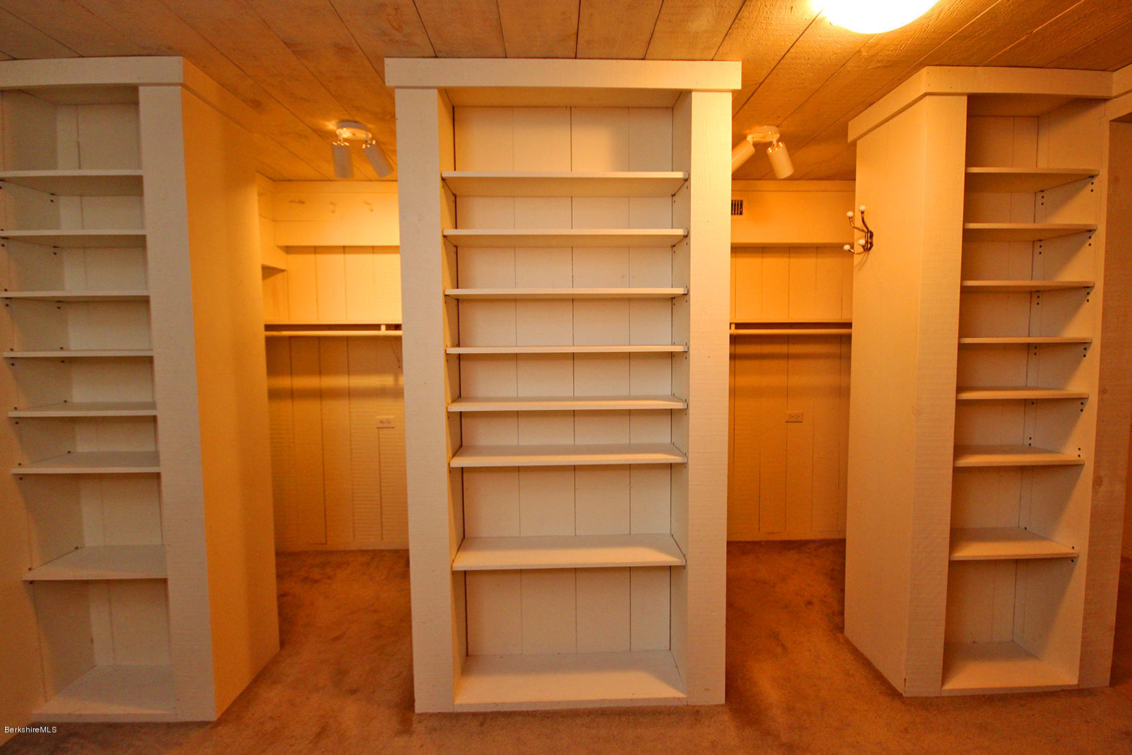 315 Canaan Road Sheffield, MA 01222 - Photo 17 of 40 a view of walk in closet with empty racks