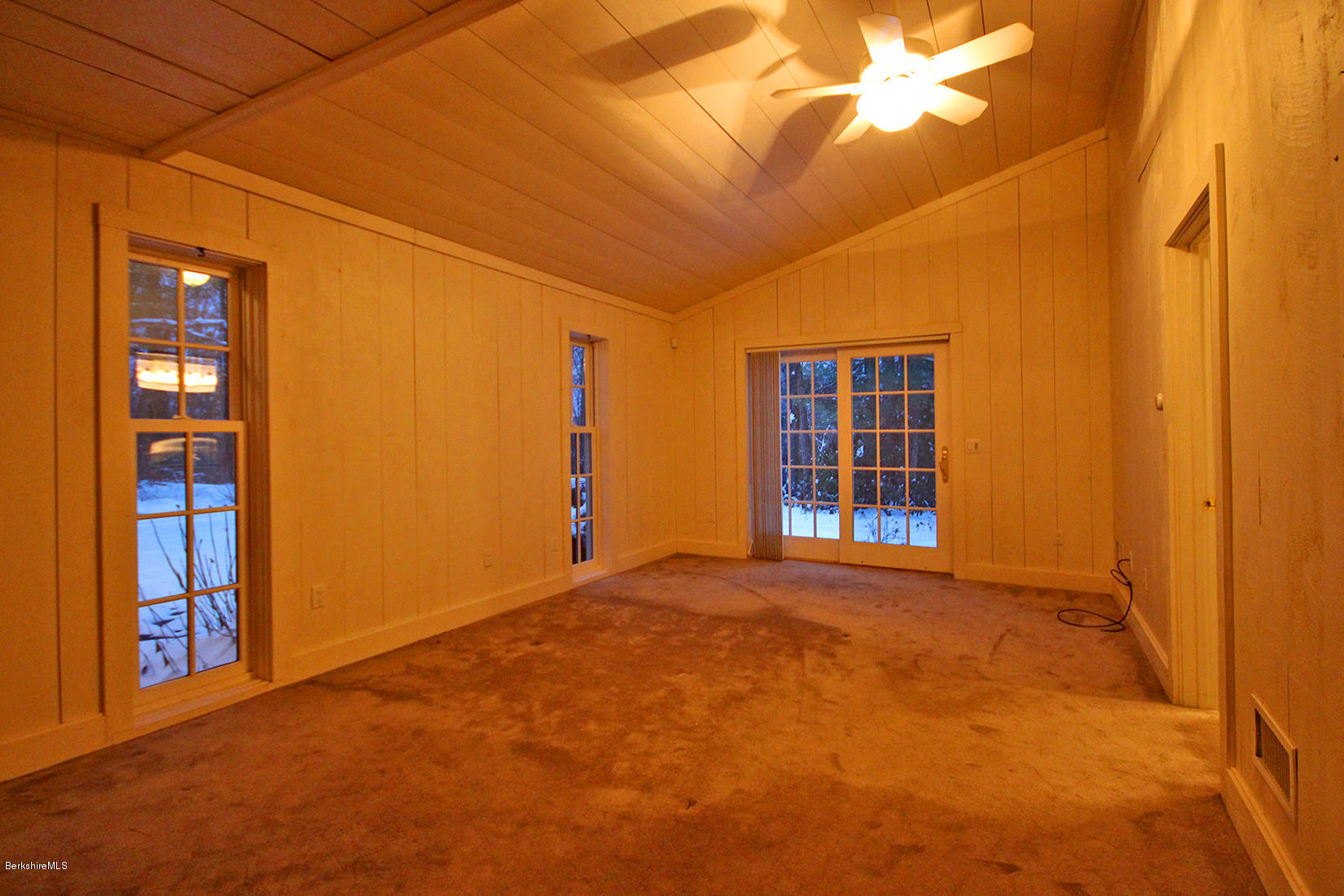315 Canaan Road Sheffield, MA 01222 - Photo 18 of 40 a view of an empty room with windows
